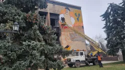 Il murales del "Cosacchetto" in restauro sull'edificio del sindacato di Izium / AG / ACI Group