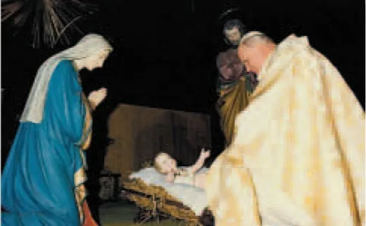 Giovanni Paolo II prega dinanzi al presepe offerto dalla parrocchia di San Gioacchino |  | pubblico dominio 